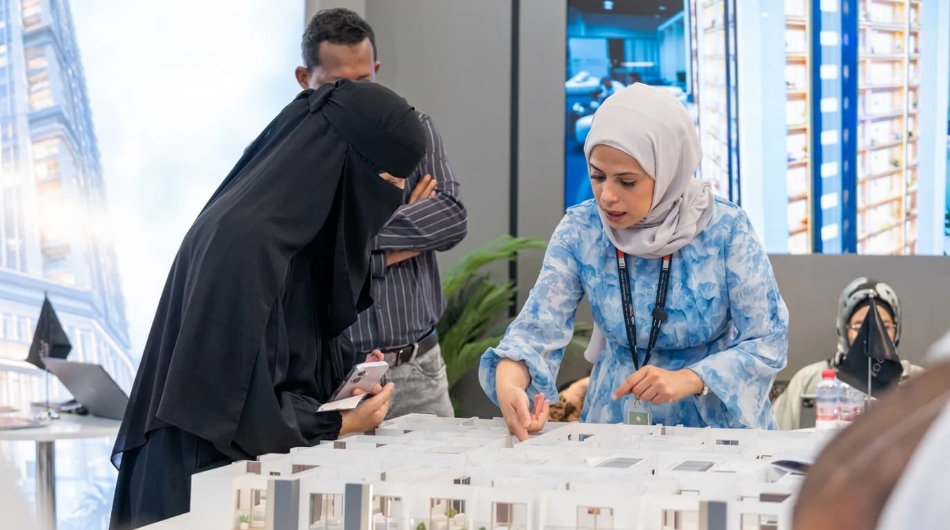 Who attended the Ajman Real Estate Investment Exhibition?